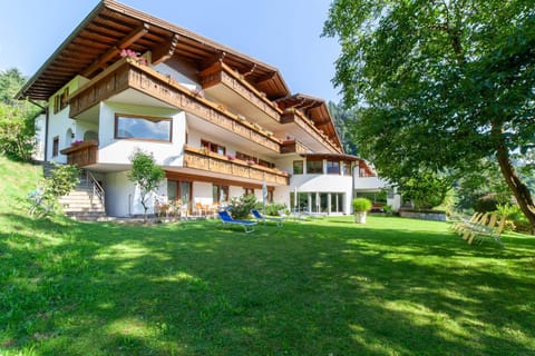 Property building, Patio, Natural landscape, Garden, View (from property/room), Spa and wellness centre/facilities, Garden view, Swimming pool