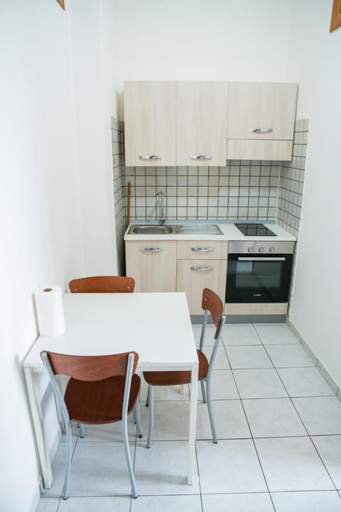 Kitchen or kitchenette, oven, stove