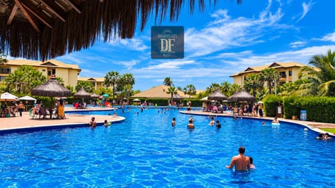 Facade/entrance, Day, People, Pool view, Swimming pool, group of guests, sunbed