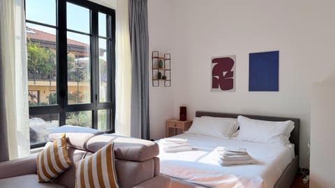 Property building, Bed, Natural landscape, Living room, Seating area, Garden view, towels