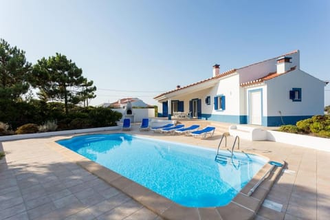 Property building, Patio, Pool view, Swimming pool, sunbed