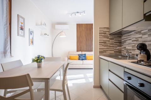 Kitchen or kitchenette, Living room, Seating area, stove