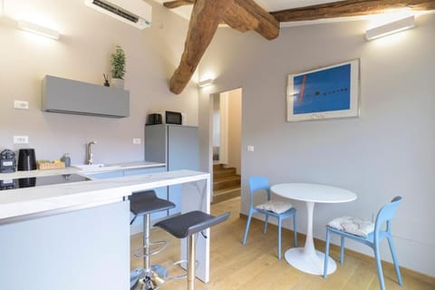 Kitchen or kitchenette, Dining area, stove, air conditioner