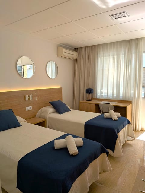 Bed, Photo of the whole room, Bedroom, towels, air conditioner