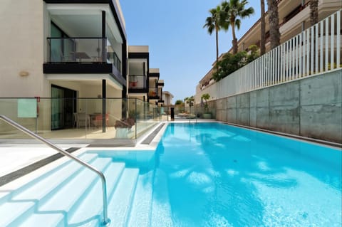 Property building, Living room, Swimming pool