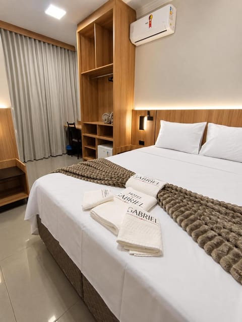 Bed, Bedroom, towels, wardrobe, air conditioner