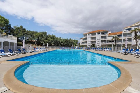 Property building, Living room, Swimming pool