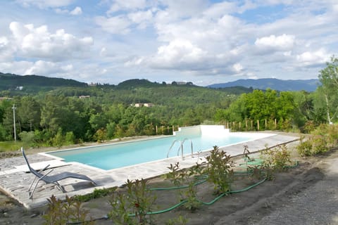 Property building, Living room, Swimming pool