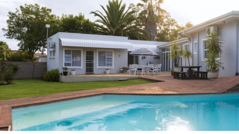 Property building, Patio, Patio, View (from property/room), Garden view, Garden view, Pool view, Pool view, Swimming pool, Swimming pool, Parking