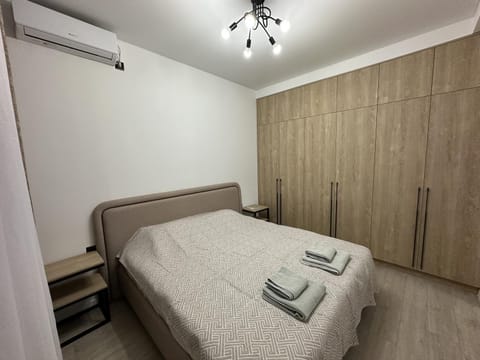 Bed, Photo of the whole room, Bedroom, towels, wardrobe