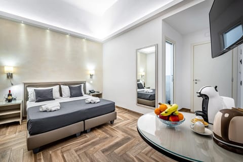 Bed, TV and multimedia, Kitchen or kitchenette, Living room, Food and drinks, Photo of the whole room, Seating area, Dining area, Bedroom, Food, towels