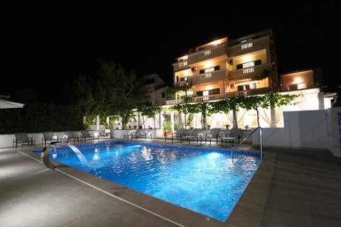 Property building, Night, Balcony/Terrace, Pool view, Swimming pool, Swimming pool