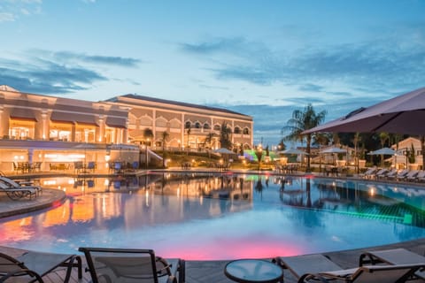 Property building, Day, Natural landscape, Pool view, Swimming pool, sunbed