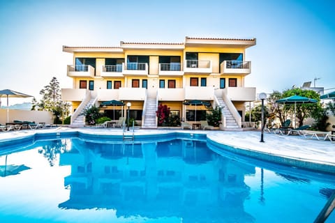 Property building, Day, Pool view, Swimming pool, Sunrise, Sunset, sunbed