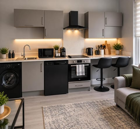 Coffee/tea facilities, Kitchen or kitchenette, Living room, Seating area, Dining area, oven, stove