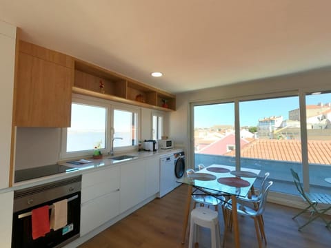 Kitchen or kitchenette, dishwasher, oven, stove