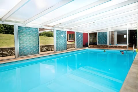 Property building, Living room, Swimming pool