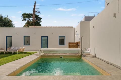 Property building, Living room, Swimming pool