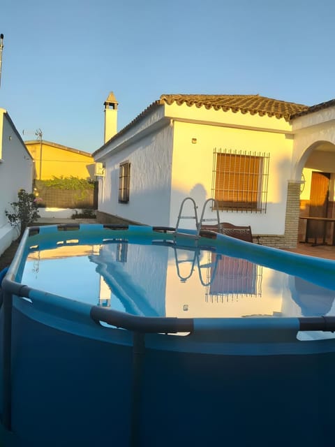 Property building, Living room, Swimming pool