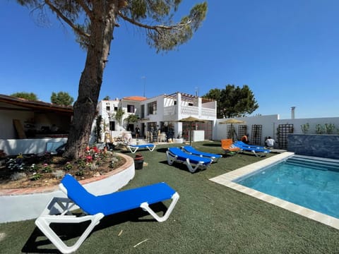 Property building, Living room, Swimming pool