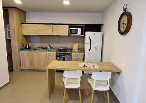 Kitchen or kitchenette, microwave, oven