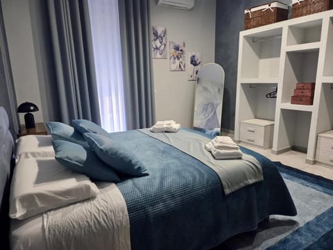 Bed, Photo of the whole room, Bedroom, towels, air conditioner
