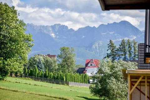 Property building, Spring, Day, Natural landscape, Mountain view