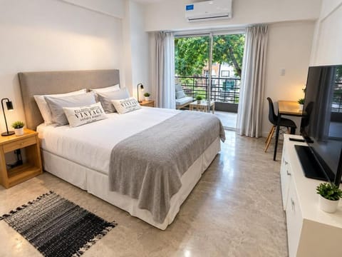 Communal lounge/ TV room, Bed, TV and multimedia, Photo of the whole room, Evening entertainment, Bedroom, hair dresser, air conditioner