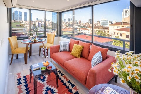 Property building, Patio, Communal lounge/ TV room, Day, View (from property/room), Balcony/Terrace, Living room, Seating area, Evening entertainment, City view