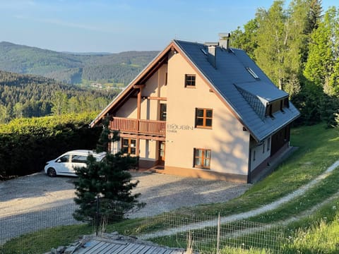 Property building, Spring, Day, Neighbourhood, Natural landscape, Mountain view, Parking