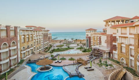 Property building, Restaurant/places to eat, Restaurant/places to eat, Day, Natural landscape, BBQ facilities, Balcony/Terrace, Beach, Beach, Garden view, Pool view, Sea view, Swimming pool, Swimming pool, sunbed