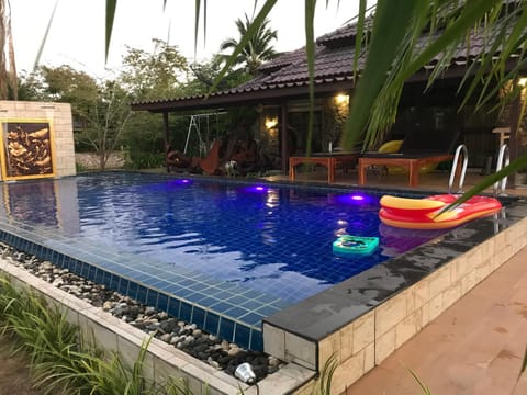 Property building, Patio, Balcony/Terrace, Dining area, Swimming pool