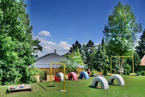 Property building, Facade/entrance, Natural landscape, Activities, Children play ground, Garden, Garden view, Sports