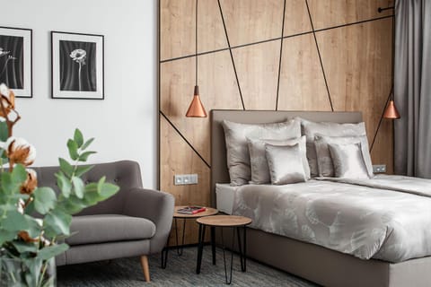 Bed, Living room, Seating area, Bedroom