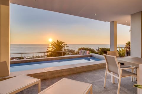 View (from property/room), Balcony/Terrace, Seating area, Sea view, Swimming pool, sunbed