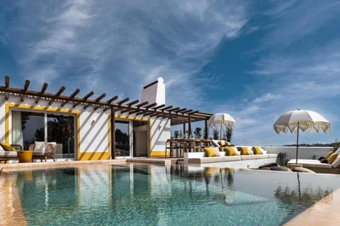 Property building, Day, Natural landscape, Pool view, Swimming pool, sunbed