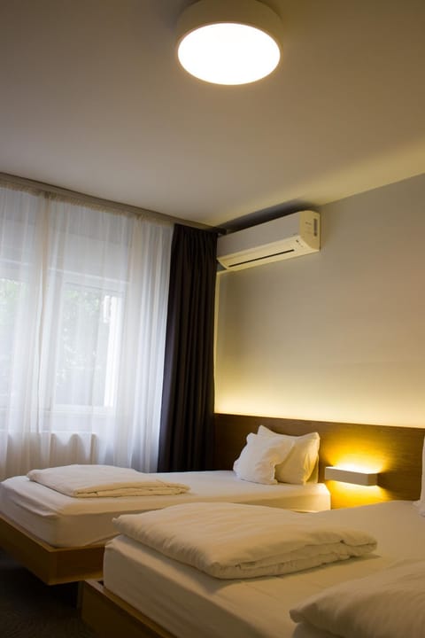 Bed, air conditioner