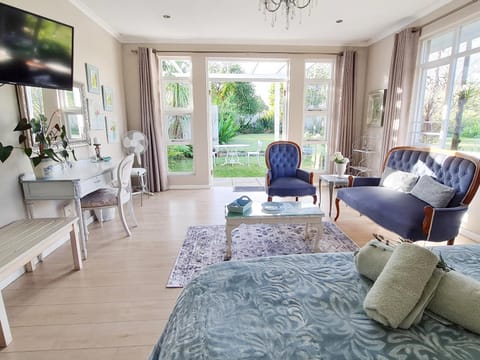 Bed, View (from property/room), Living room, Seating area, Bedroom