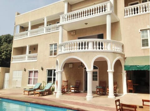View (from property/room), Seating area, Swimming pool, sunbed