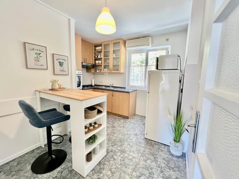 Kitchen or kitchenette, oven, stove