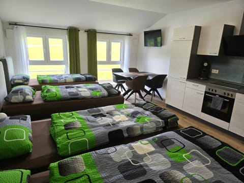 Bed, TV and multimedia, Kitchen or kitchenette, Photo of the whole room, Seating area