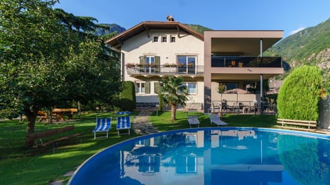 Facade/entrance, Off site, Day, Natural landscape, Garden, Swimming pool, Swimming pool