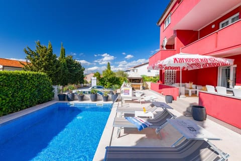 Property building, Patio, Day, View (from property/room), Balcony/Terrace, Seating area, Pool view, Swimming pool, sunbed