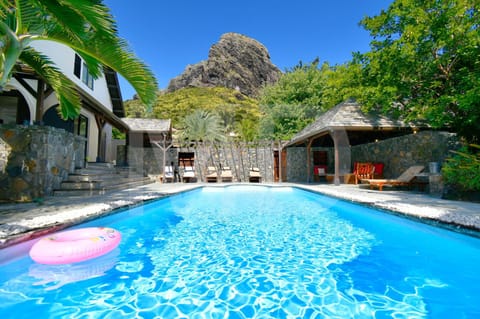 Property building, Patio, Mountain view, Swimming pool, sunbed