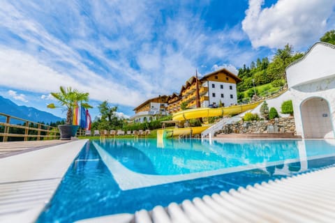 Property building, Day, Natural landscape, Mountain view, Pool view, Swimming pool, sunbed
