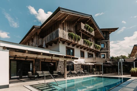 Property building, Swimming pool, Swimming pool, sunbed