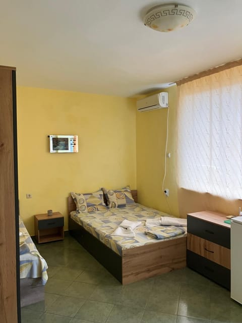 Bed, Photo of the whole room, Bedroom, towels, air conditioner