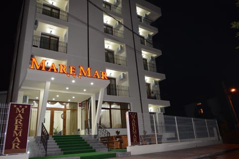 Facade/entrance, Facade/entrance, Night, Property logo or sign