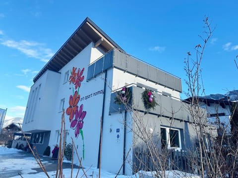 Property building, Day, Property logo or sign, Natural landscape, Winter, View (from property/room), Logo/Certificate/Sign