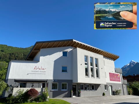 Property building, Day, Property logo or sign, Natural landscape, Activities, Summer, Logo/Certificate/Sign, Mountain view, locker, soundproof